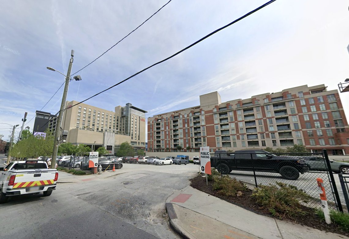 The surface parking lot at 289 Marietta St NW as it operates today