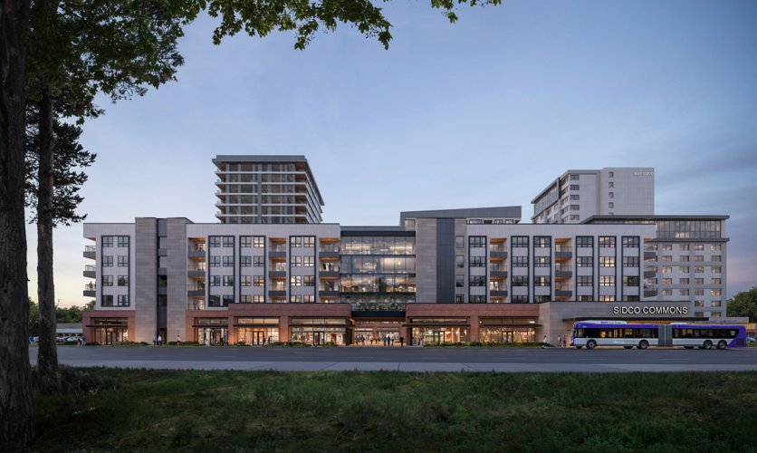Street-level rendering of SidCo Commons along Sidco Drive, showing retail frontage, apartments, and hotel components