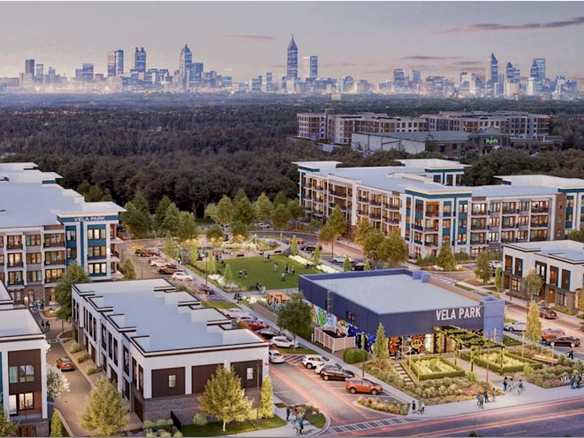Aerial rendering of Vela Park showing the food hall, residences, and central green