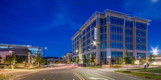 The Nexus at Waverly illuminated at night