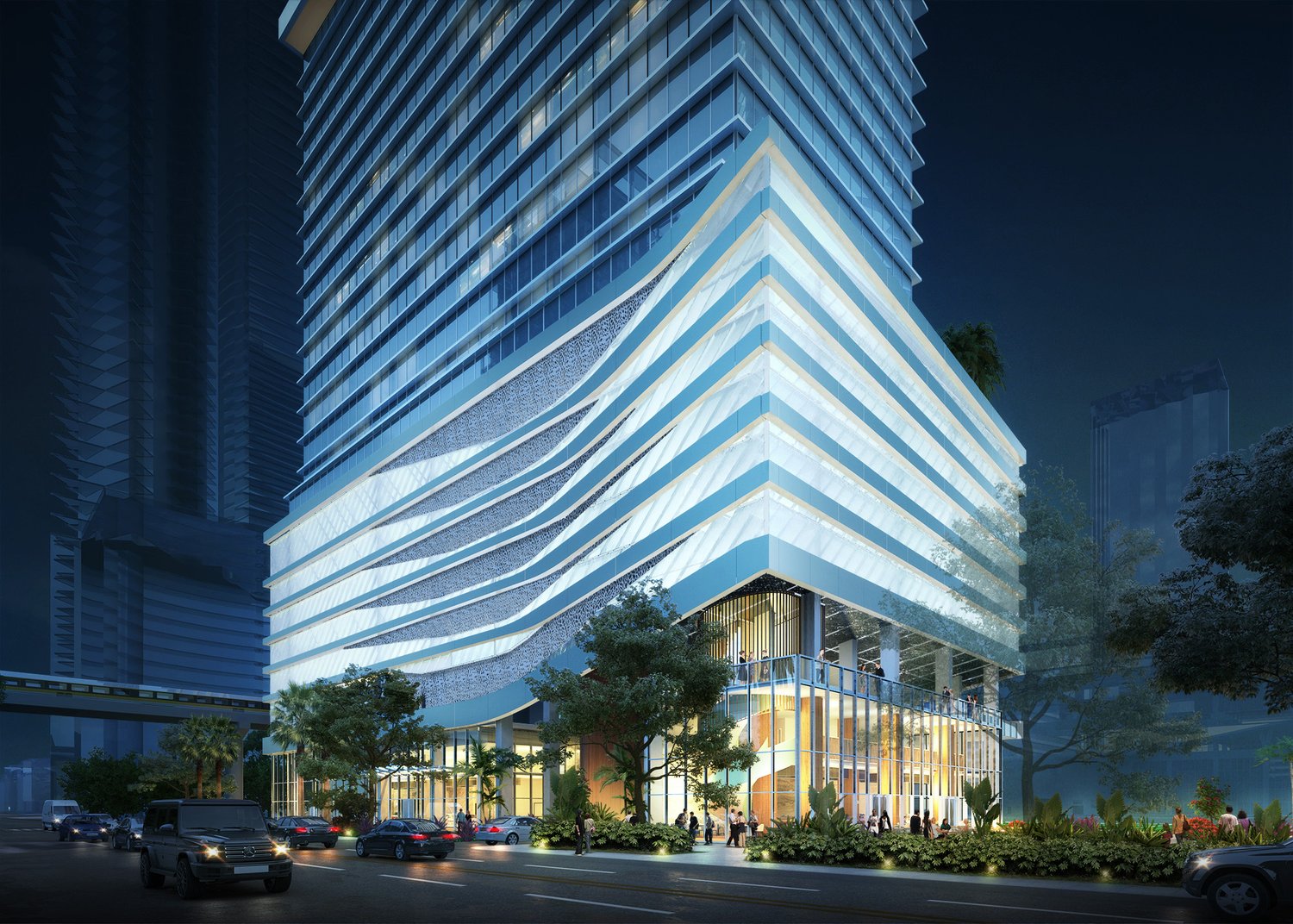 Night rendering of the tower's illuminated podium at Miami Worldcenter Block C East