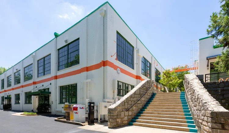 Building C at Southern Dairies, with stone entry stairs off North Avenue