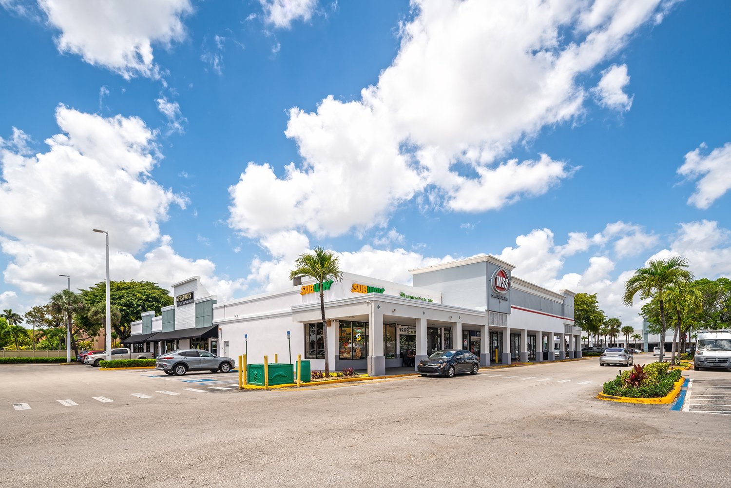 Storefronts at Airpark Plaza Shopping Center, including Subway and WSS
