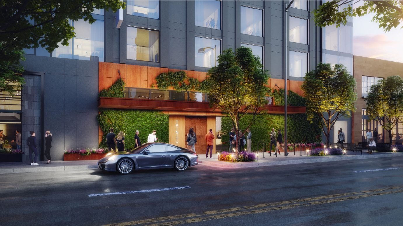 Rendering of Hotel Trinity's street-level entrance at dusk