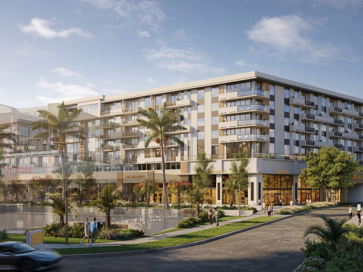 Rendering of a residential building with ground-floor retail at Miramar Cove