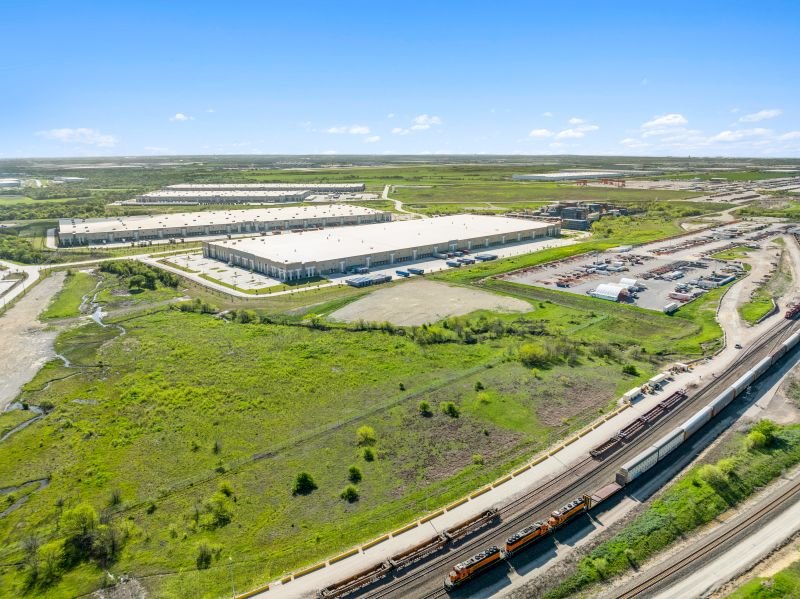 Aerial view of the Intermodal Logistics Center campus alongside BNSF rail lines in Haslet
