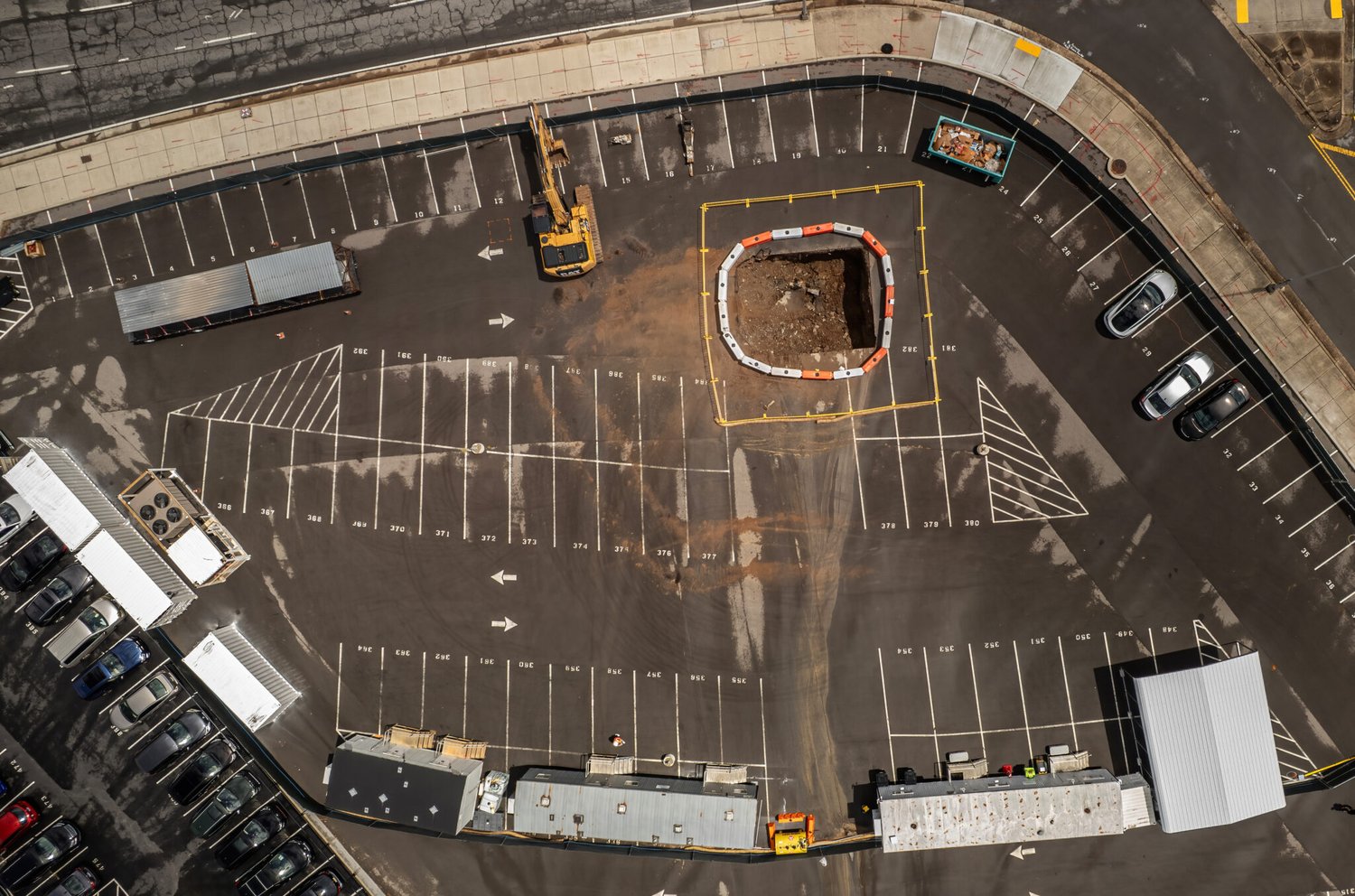 Aerial view of site investigation work on one of the state-owned Capitol-area parking lots slated for redevelopment