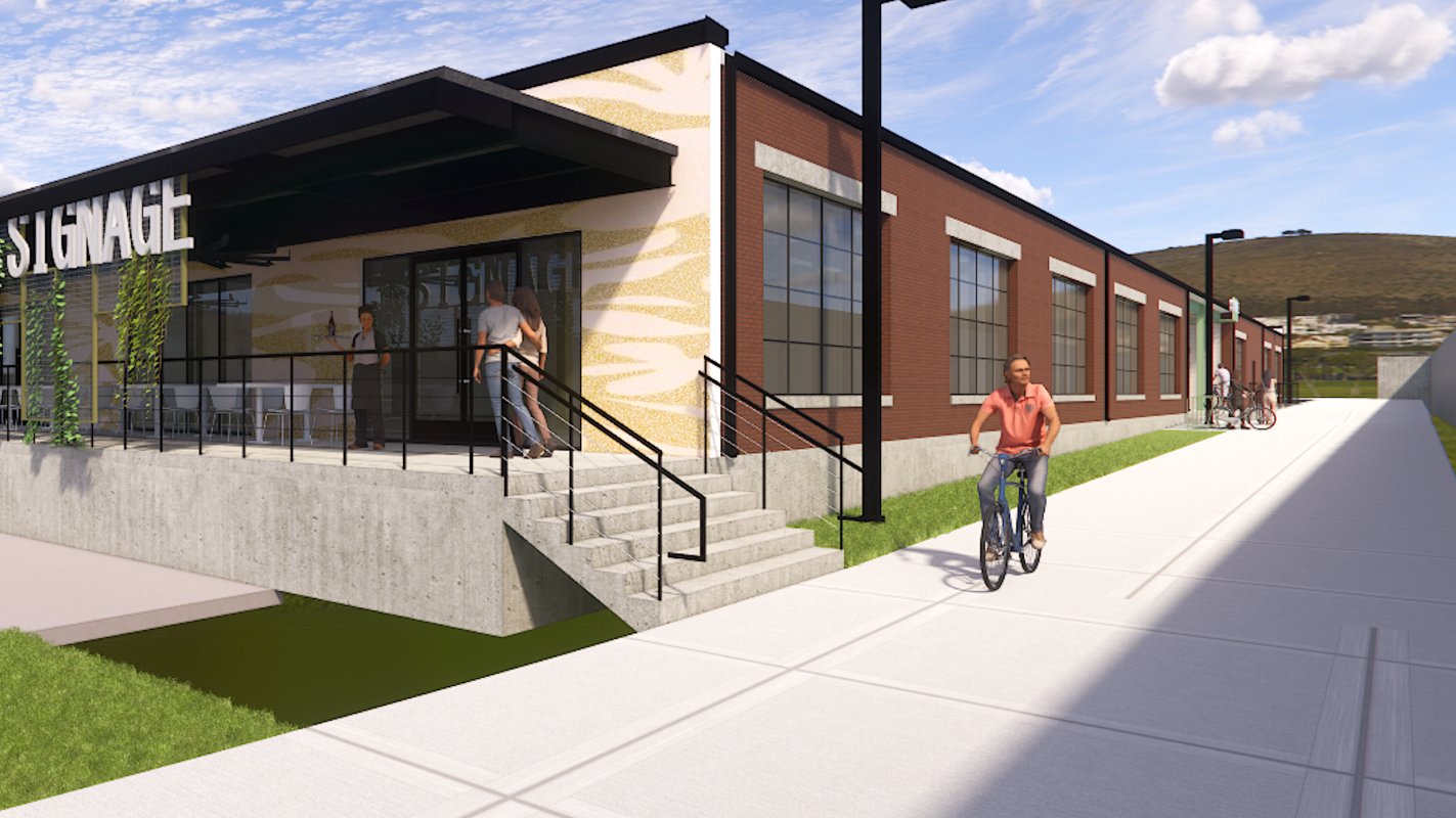 Rendering of The Berkeley adaptive reuse along the Beltline, showing the renovated 1950s brick building