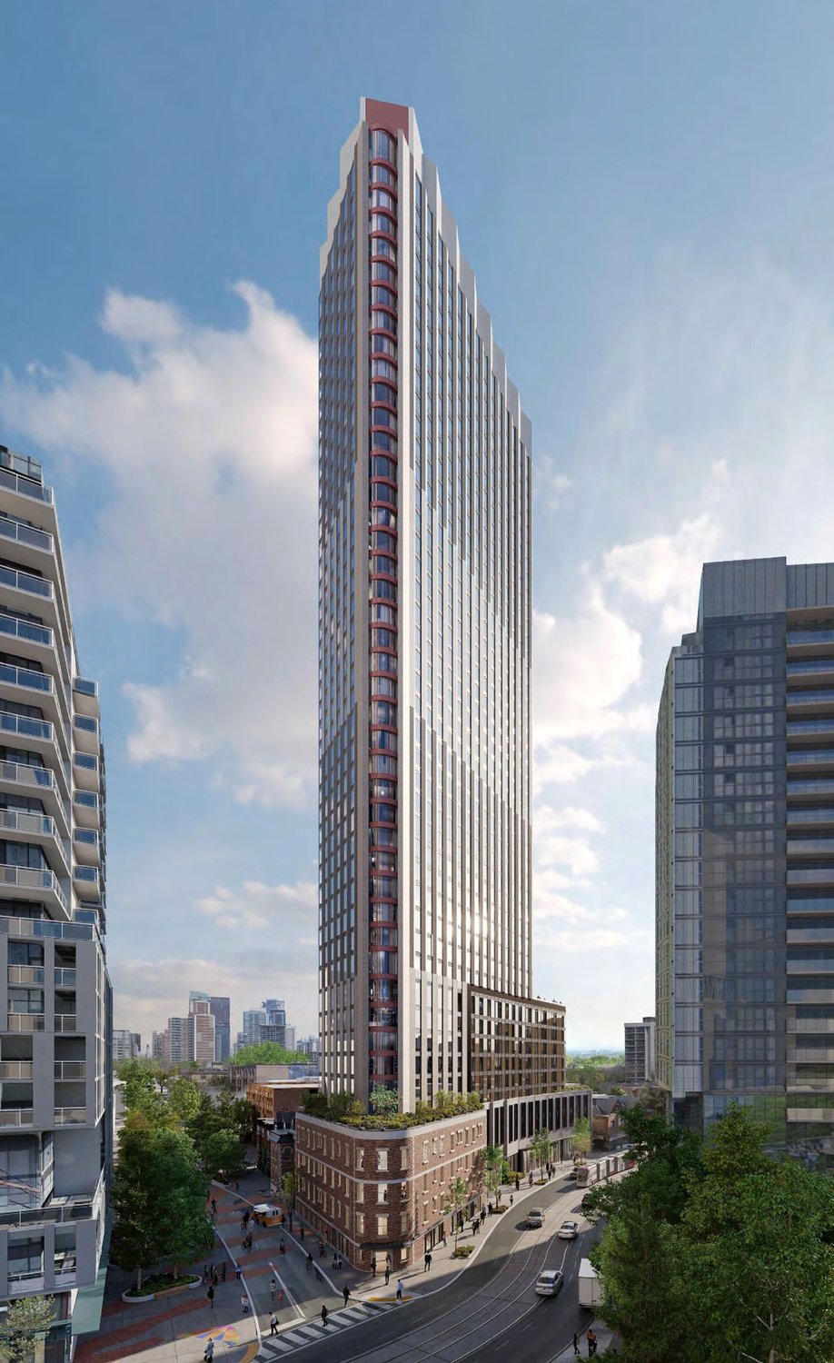 Rendering of the proposed 44-storey rental tower at 218 Dundas Street East, with the heritage Filmores Hotel facade retained at the base