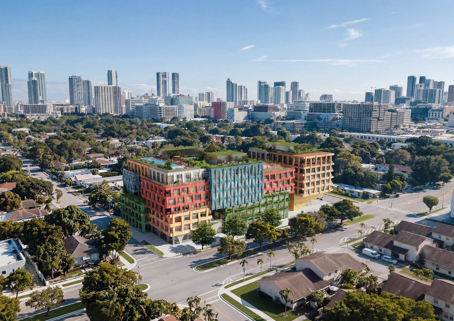 Aerial rendering of WOMA in Wynwood with the Miami skyline beyond