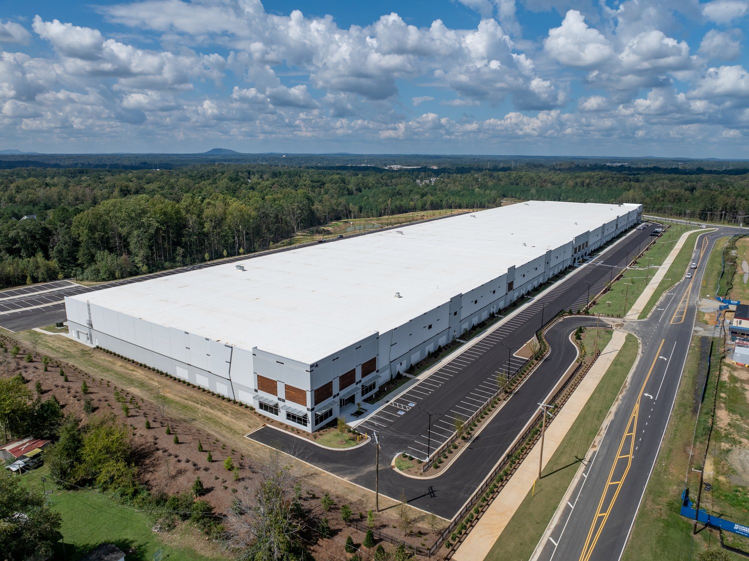 Aerial view of AXIAL Rapid Commerce and its parking and road frontage