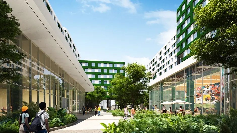 Pedestrian-level view of the Gables Village courtyard and ground-floor retail at the University of Miami