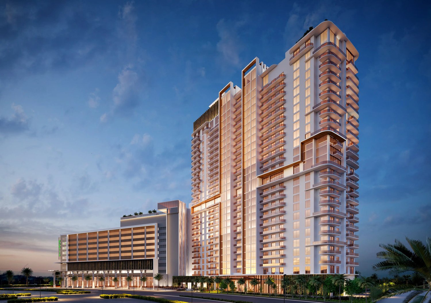 Dusk rendering of Shoma Bay's residential tower and retail podium in North Bay Village