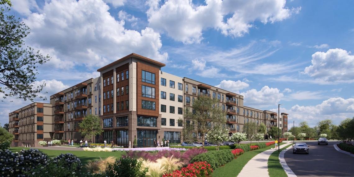 Street-level rendering of The Standard at Kennesaw showing the main entry and landscaped frontage