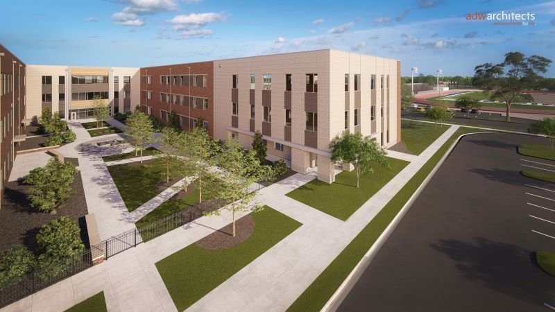 Rendering of classroom wings and courtyard at the new North Mecklenburg High School, with athletic fields beyond