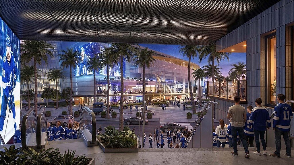 Rendering of the covered plaza at Water Street Tampa's Block D entertainment district on event night, with Amalie Arena beyond
