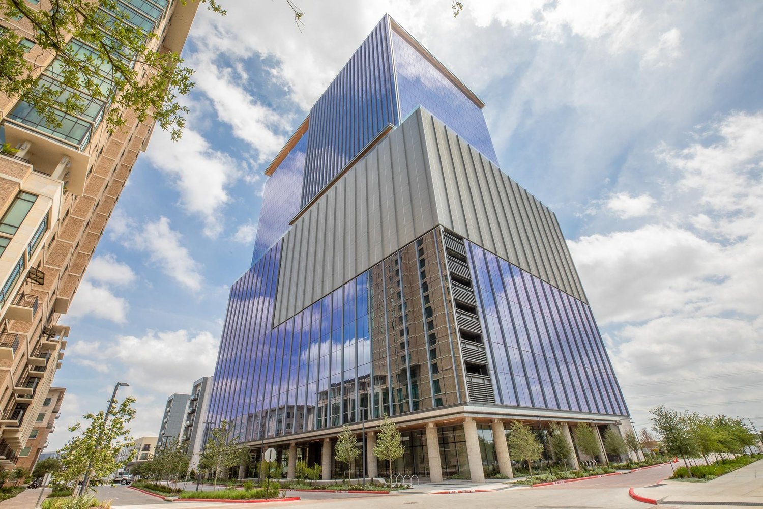 Street-level view of Domain Tower 2's podium and ground-floor lobby
