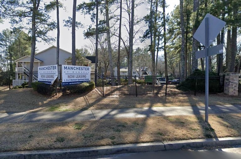 Entrance to the Manchester at Mansell apartment community in Alpharetta, sold by Related Cos. for more than $100M