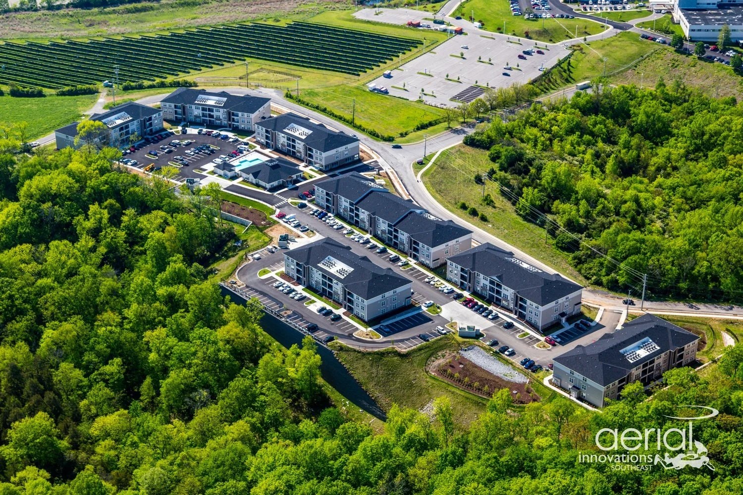 Aerial view of Skyline Ridge Apartments with the neighboring solar farm