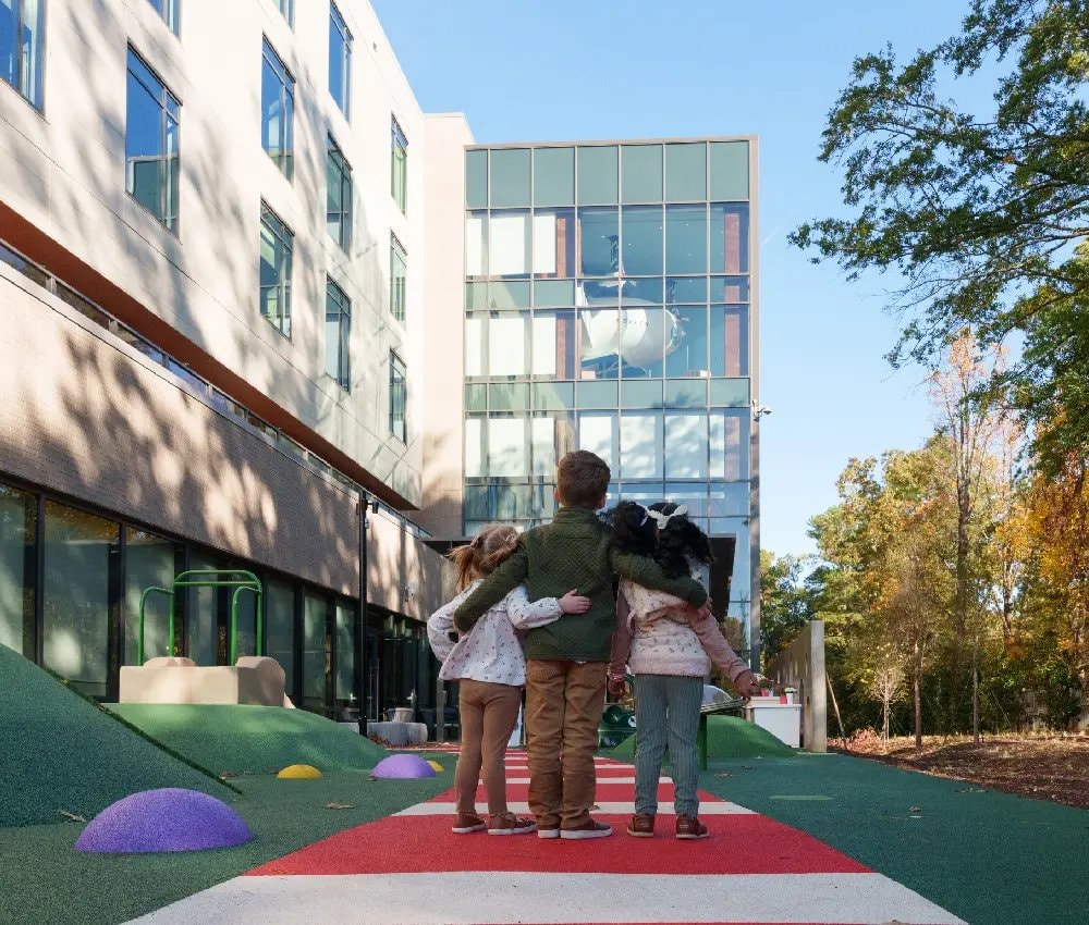 Children at the outdoor play area of the new Ronald McDonald House of Atlanta