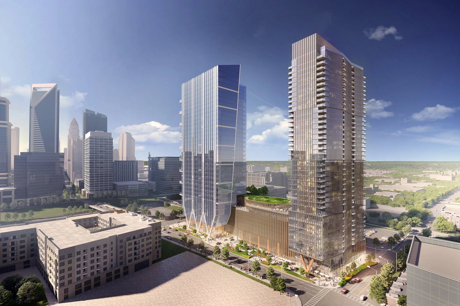 Aerial rendering of Queensbridge Collective with the uptown Charlotte skyline beyond
