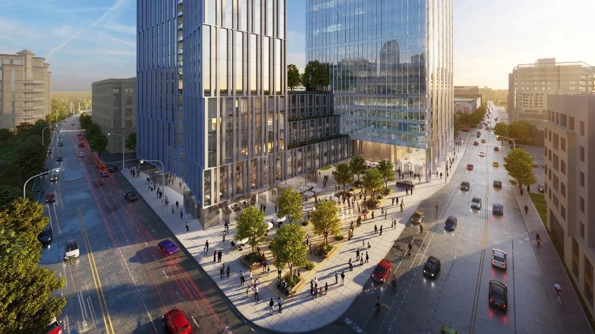 Street-level rendering of the public plaza at Queensbridge Collective