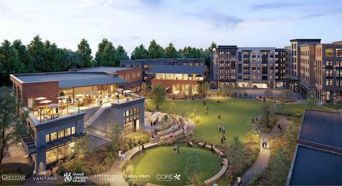 Evening rendering of Chamblee City Center showing the central park, retail, and apartment buildings